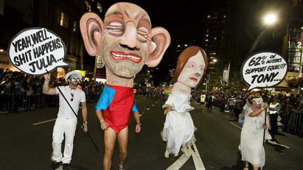 Participants in Sydney's Gay and Lesbian Mardi Gras send a message to federal politicians.