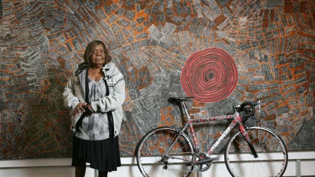 High-tech imaging ... artist Wentja Napaltjarri and the $15,000 racing bike she painted.
