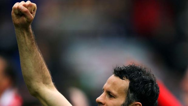 Ryan Giggs celebrates Manchester's United victory in the Premier League.