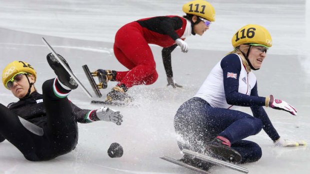 Last woman standing: China's Li Jianrou skates to gold as her opponents tumble.