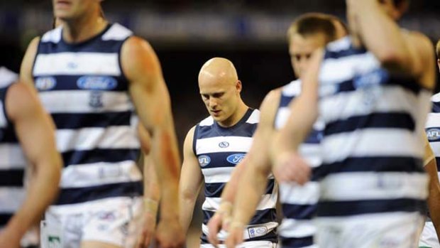 Geelong's Gary Ablett looks dejected after the Cats fell to a rampaging Collingwood at the MCG last night.