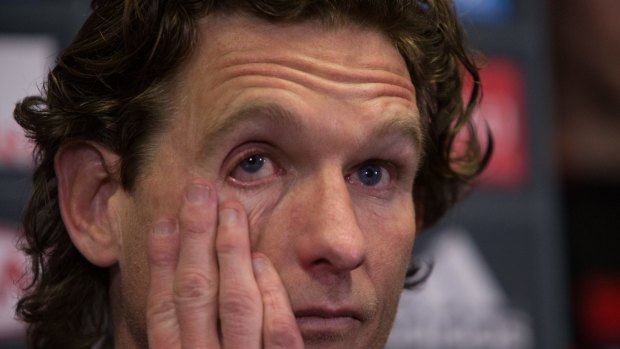 James Hird sheds a tear at the press conference to announce he was stepping down.