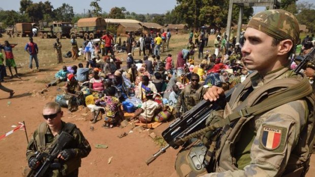 French soldiers stand guard as Muslim people wait to seek refuge at the Boali church, 100km north of Bangui.