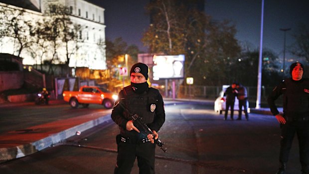 Turkish police officers cordon off the roads around the stadium.