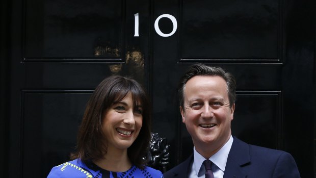 Britain's Prime Minister David Cameron and his wife Samantha return to Number 10 Downing Street after the general election.