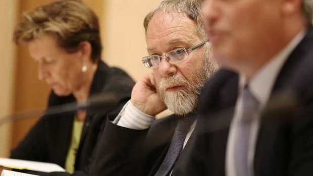 David Tune, Depart of Finance Secretary, during an estimates hearing at Parliament House in Canberra.