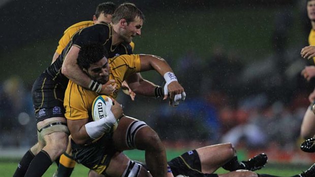 Sludge match  ... Sitaleki Timani is wrestled to the ground on a sodden night in Newcastle  dominated by endless forward runs. Scotland's pack held its own to win a  last-minute penalty.