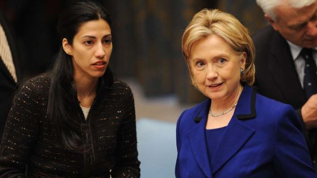 Pregnant ... Huma Abedin, left, with Hillary Clinton.