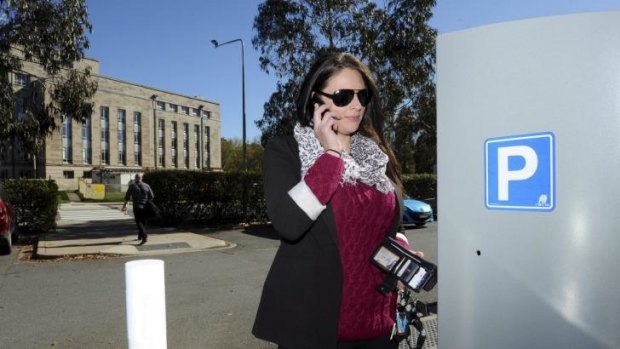 The first day of paid parking caused problems for public servant Emilie Rohan, who was forced to call the help line when the parking machine ate her coins.