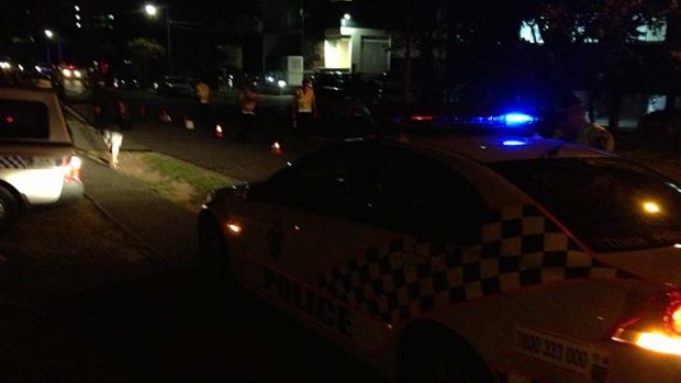 Residents says hundreds of police have descended on West End, near a Bandidos bikie gang clubhouse.
