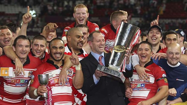 Born winner ... Michael Maguire celebrates winning the Super League title with Wigan last year.