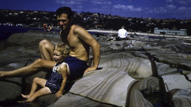A man and girl at the rock pools at Sydney's Balmoral.