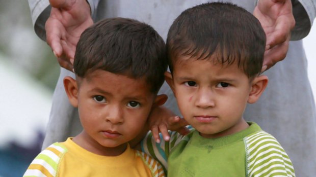 Two displaced boys in a refugee camp north-west of Islamabad.