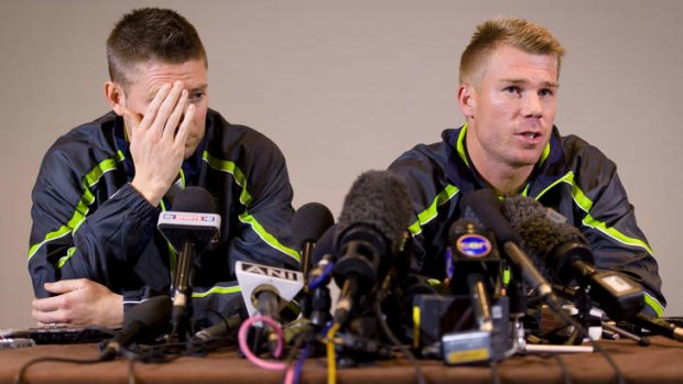 Run of outs: Injured captain Michael Clarke and a repentant Dave Warner face the music on Thursday.