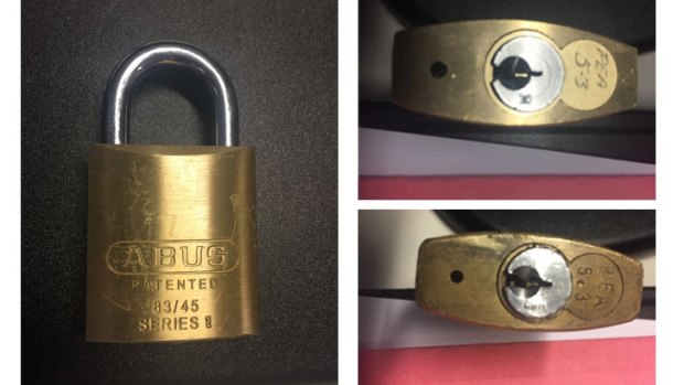 The padlocks have "PEA5.3" engraved on them near the locking mechanism.