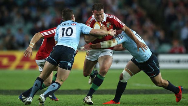 Key man: Jamie Roberts was at his dangerous best for the Lions before injury ended his night, and possibly his tour.