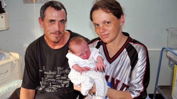Damien and Kylie Kilmurray with their baby boy who was born at Dunsborough Lakes Caravan Park.