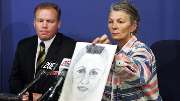 Maree Howell, with a picture of her daughter Rose Rain.