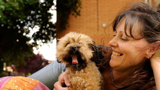 Debra Tranter, with Oscar, believes new legislation will help cut down the abuse of dogs in Victoria.