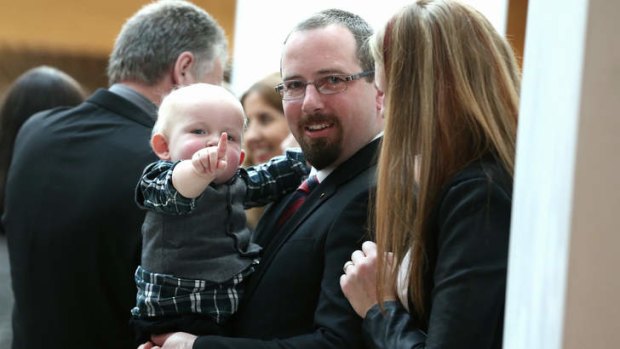 Motoring Enthusiast Senator Ricky Muir with his son at the senators' swearing-in reception.