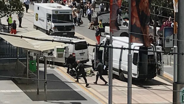 Bomb squad arrives at Bourke Street mall to investigate a suspicious package. Picture: Joe Armao