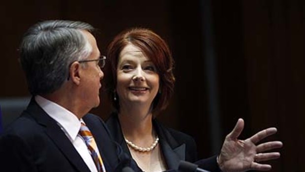 Julia Gillard and  Wayne Swan announce the deal.