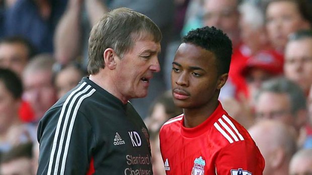 Into the fray: Kenny Dalglish sends on Raheem Sterling, 17.