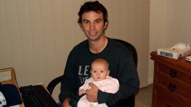 Killed ... Drew Grant with his baby daughter, Ella.