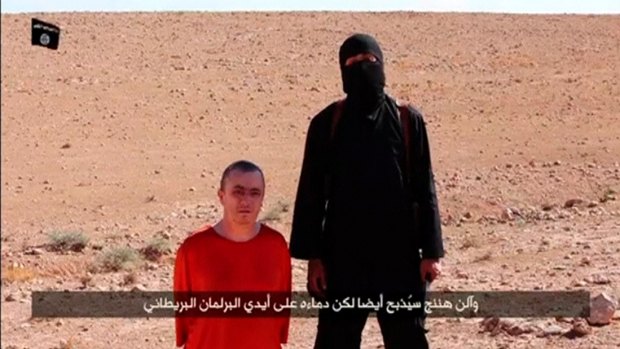 Islamic State's Alan Henning before being executed by the militant known as 'Jihadi John'. 