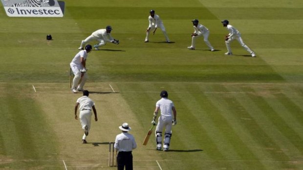England captain Alastair Cook is caught behind by his Indian counterpart, Mahendra Singh Dhoni, on the second day of the second Test at Lord's on Friday.