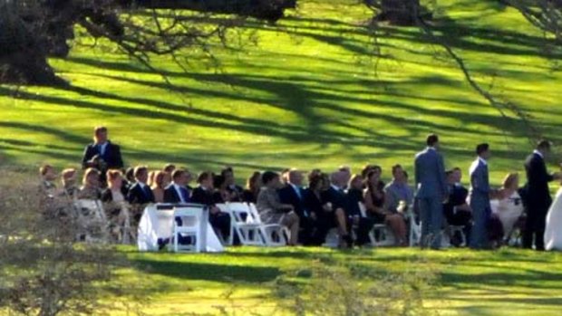 The bride wore white ... Kate Ritchie and Stuart Webb tie the knot yesterday under the trees at Quamby Estate.