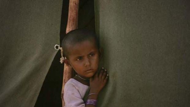 A Pakistani child at a camp set up for people displaced by the floods in Thatta.