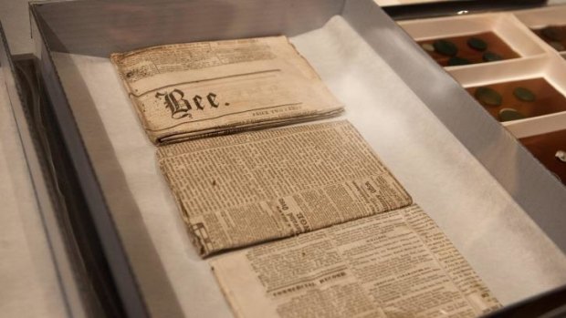 Newspapers and coins found in a 1795 time capsule.