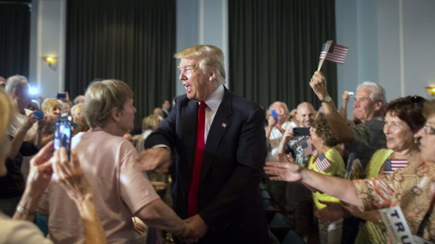 Republican presidential hopeful Donald Trump greets supporters at a South Carolina campaign rally on Tuesday.