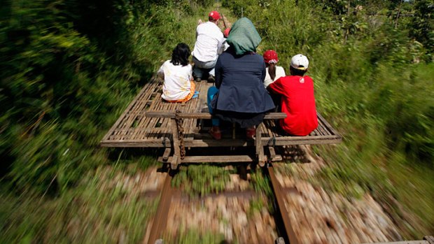 Cambodia has reopened a stretch of railway destroyed during the country's war and officials described it as a step towards boosting regional trade through rail links with neighbours.