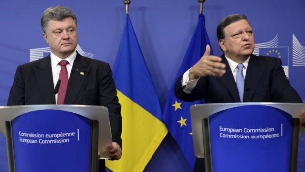 Meeting of minds: President of Ukraine Petro Poroshenko (left) and outgoing European Commission president Jose Manuel Barroso in Brussels on Saturday.