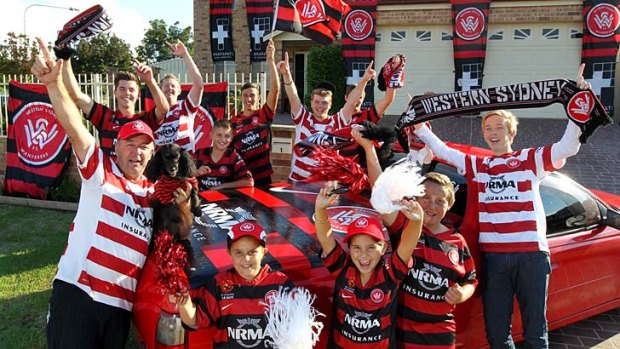 Passionate: Happy Western Sydney Wanderers' supporters gear up for Sunday's grand final against the Central Coast Mariners.