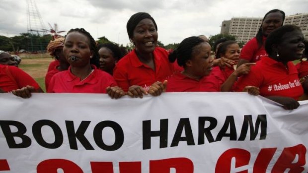 Nigerian women hold a demonstration on Wednesday calling on the government to rescue the girls.