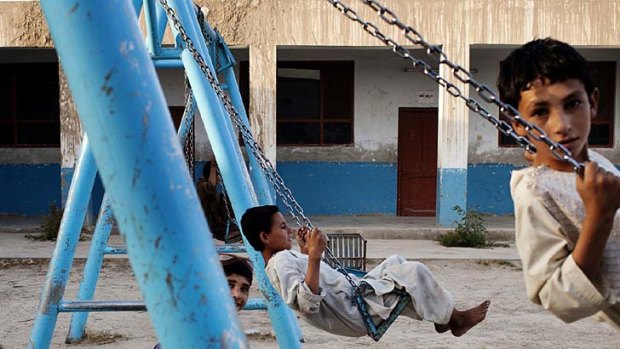Children at play in an orphanage courtyard. About 400 boys live in orphanages in Kandahar.