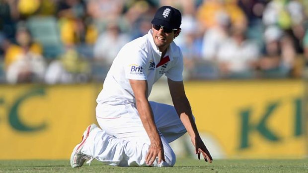 England captain Alastair Cook watches as Australia piles on the runs.