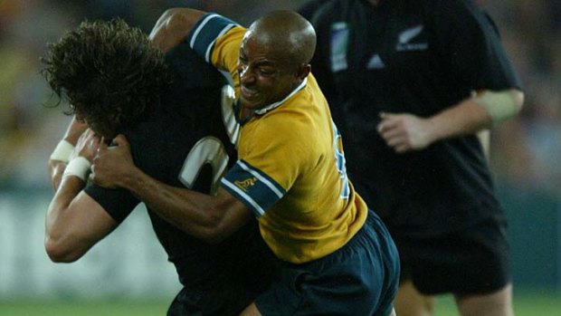 Famous sledge ... George Gregan, right, gets to grips with Byron Kelleher during the World Cup semi-final in 2003.