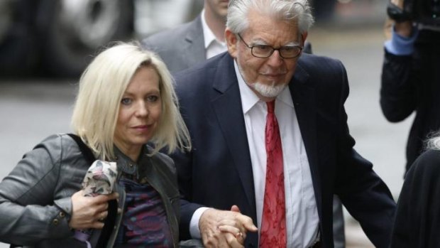 Cross-examination: Rolf Harris arrives at court with his daughter Bindi on Wednesday.