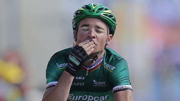 Thomas Voeckler crosses the finish line to win the 10th stage of the Tour de France on Wednesday.