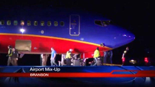Stopped at end of wrong runway ... This frame grab provided by KSPR-TV shows a Southwest Airlines flight at an airport 11 kilometres north of the intended destination in Branson, Missouri.