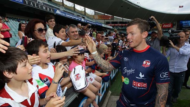 On show ... Todd Carney with fans following a Roosters match last season.