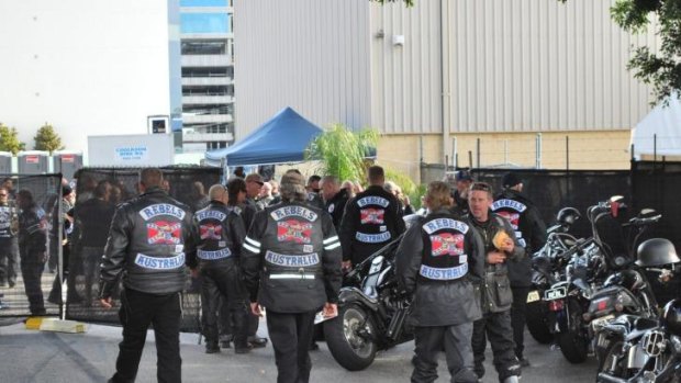 Police have found a large cache of contraband at the Wanniassa home of a senior Rebels bikie.