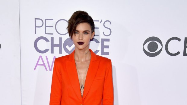 Ruby Rose with a deep side part.