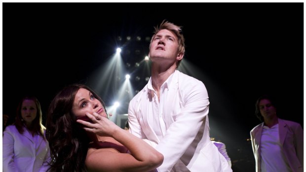 Swept off her feet: Christine Whelan as Liz Hurley and Eddie Perfect as the title character in <i>Shane Warne: the Musical</i>.