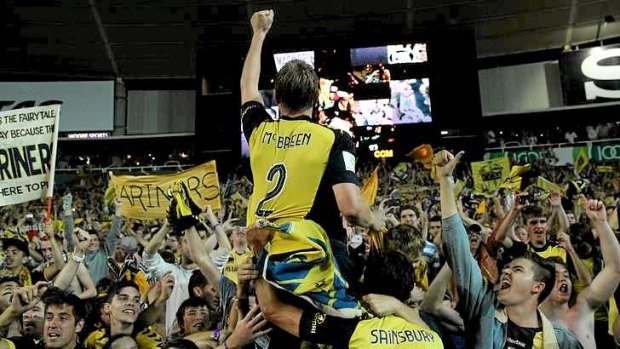 Where to from here? Daniel McBreen and Trent Sainsbury rejoice with Mariners fans at the final whistle. Could it be the last hurrah for the champions?