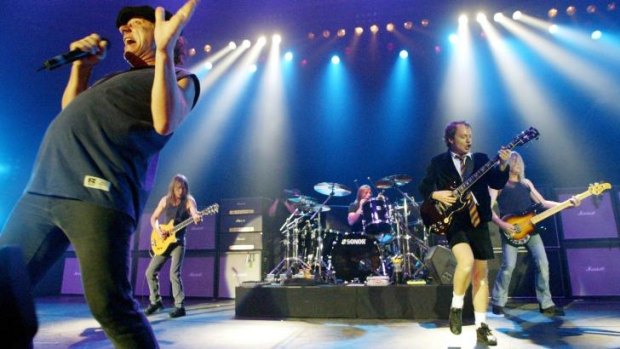 AC/DC, from left, Brian Johnson, Malcolm Young, Phil Rudd, Angus Young, and Cliff Williams performing in Munich, southern Germany.